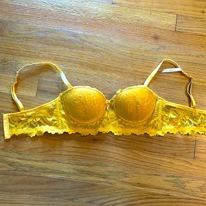 Mustard yellow push up balconette bra.